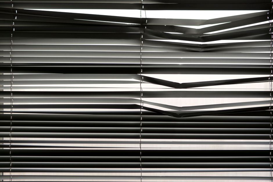 Motorized roller shades in a modern home