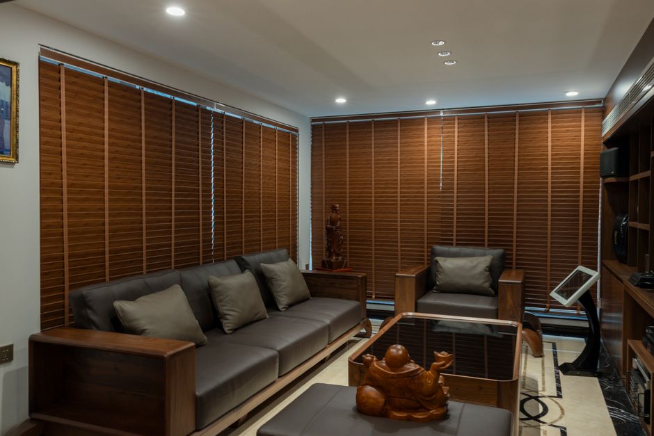 Modern living room with custom blinds and natural light
